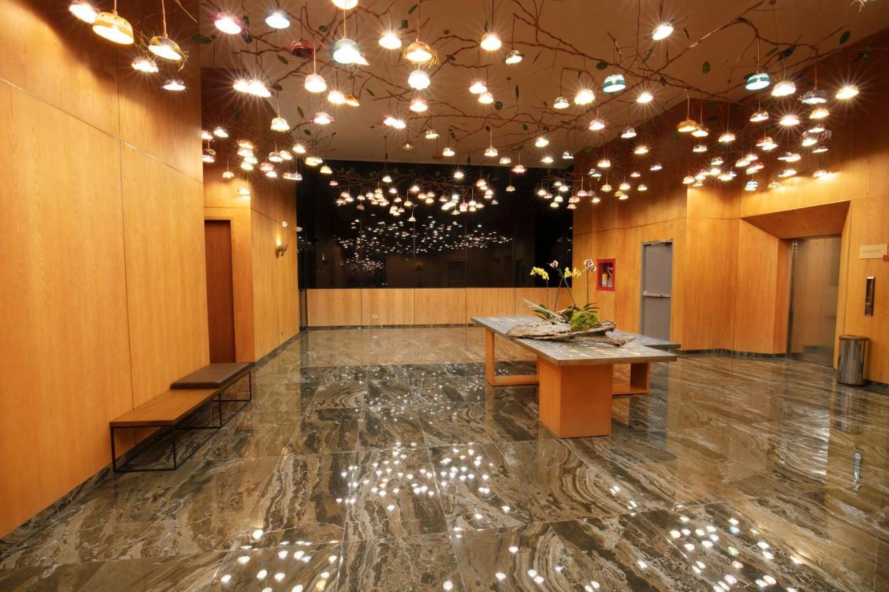 Hotel V1501 Pasto Exterior foto The lobby of the National Museum of Singapore